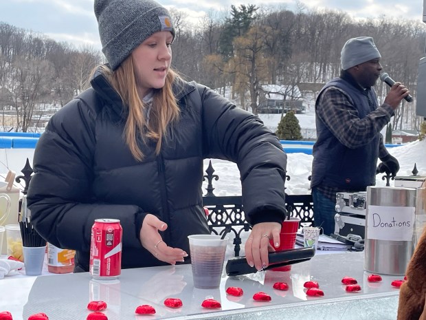Alayna Fisher of West Hurley, N.Y., tended bar at the annual Winterfest Saturday, Feb. 15, 2026, hosted by the Cornell Restaurant + Bar on the Rondout in Kingston, N.Y. (Diane Pineiro-Zucker/Daily Freeman)