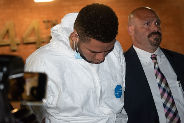Argenis de Jesus Baez Pizano is pictured in police custody leaving the NYPD's 44th Precinct stationhouse in the Bronx on Monday, June 13, 2022, after being charged with the murder of NYPD Transit Officer Arianna Reyes-Gomez. (Gardiner Anderson for New York Daily News)