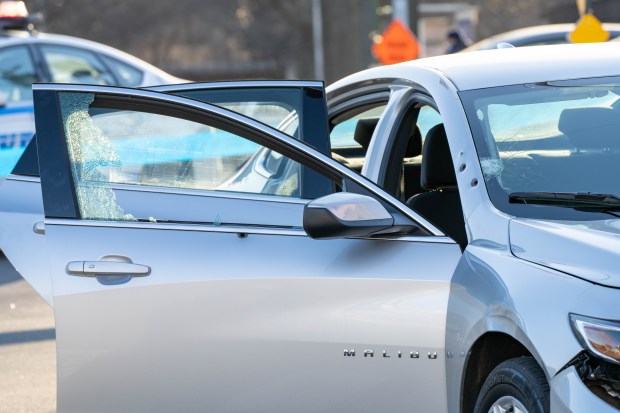 Akil Kornegay was fatally shot in a Chevrolet Malibu sedan at the intersection of Myrtle Ave. and Woodhaven Blvd. in Queens on Friday, Feb. 26, 2021. (Theodore Parisienne for New York Daily News)