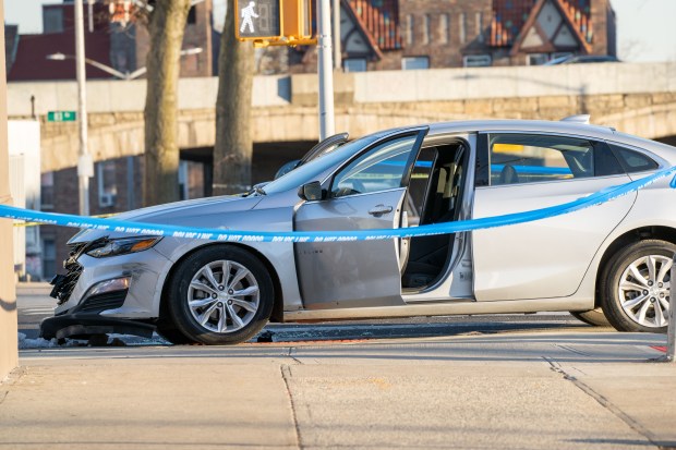 Akil Kornegay was fatally shot in a Chevrolet Malibu sedan at the intersection of Myrtle Ave. and Woodhaven Blvd. in Queens on Friday, Feb. 26, 2021. (Theodore Parisienne for New York Daily News)