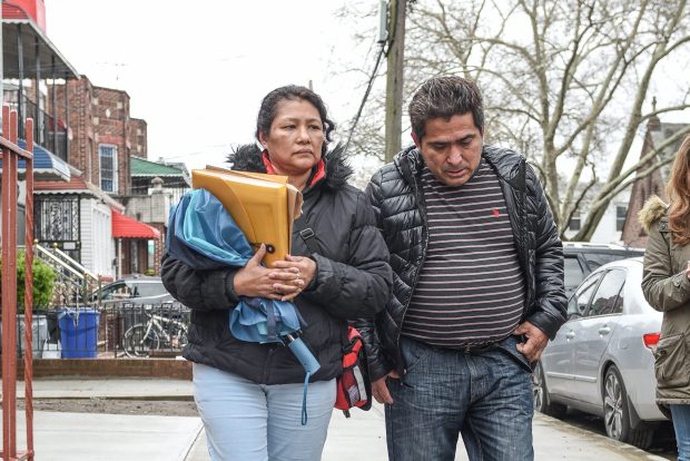 Rosa Jaramillo and Edgar Peralta, parents of Andy Peralta, are pictured in front of their home in Queens on April 27, 2018. (David Wexler for New York Daily News)