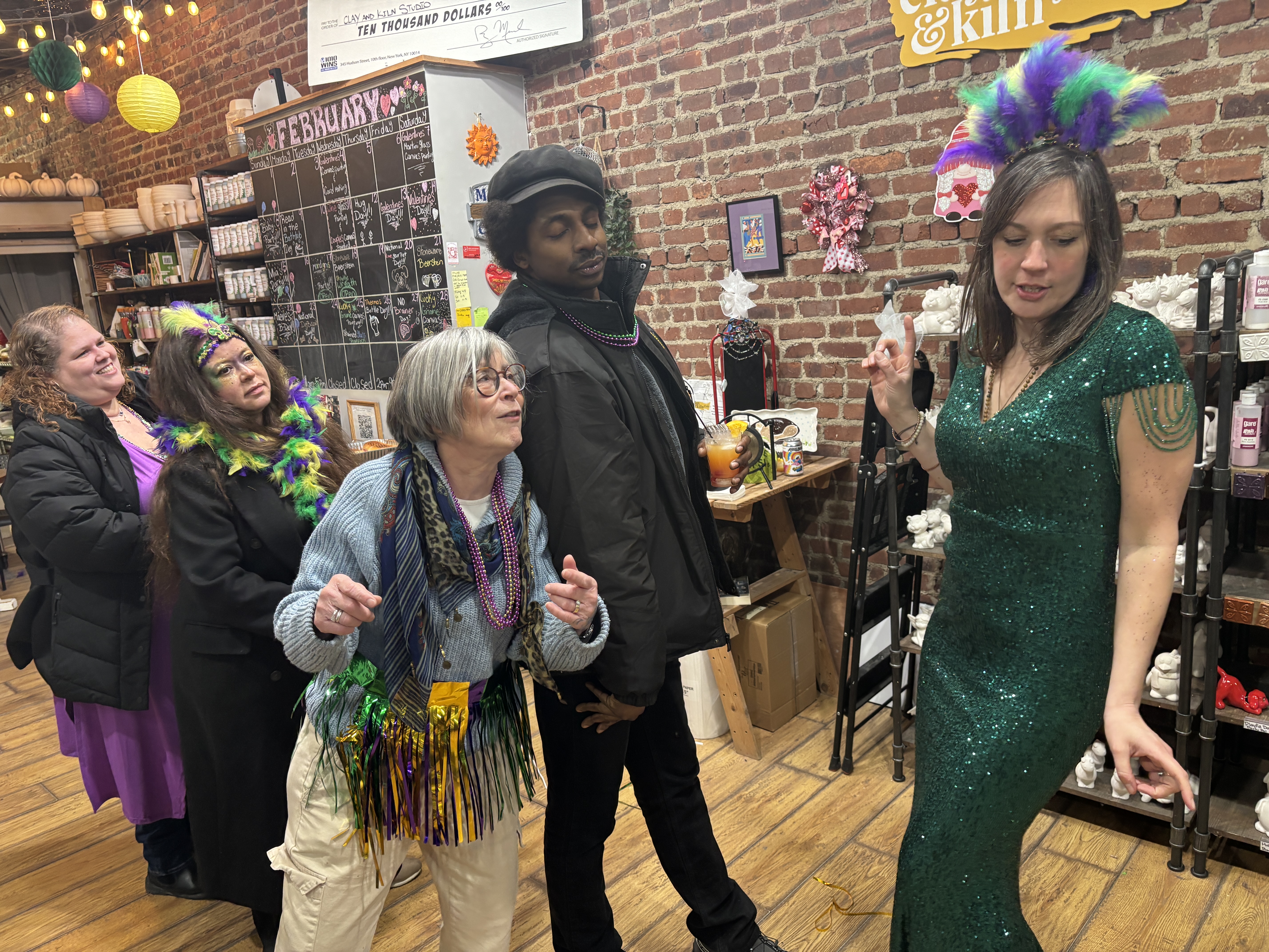 Kristin Daggan (green gown) coordinated the event with her mother-in-law Jean and the Staten Island Business Outreach Center.