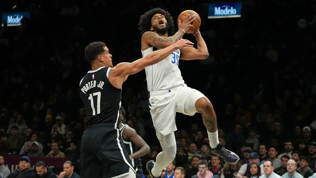 Dallas Mavericks' Marvin Bagley III (35) and Brooklyn Nets' Michael Porter Jr. (17) during the first half of an NBA basketball game Tuesday, Feb. 24, 2026, in New York. (AP Photo/Frank Franklin II)