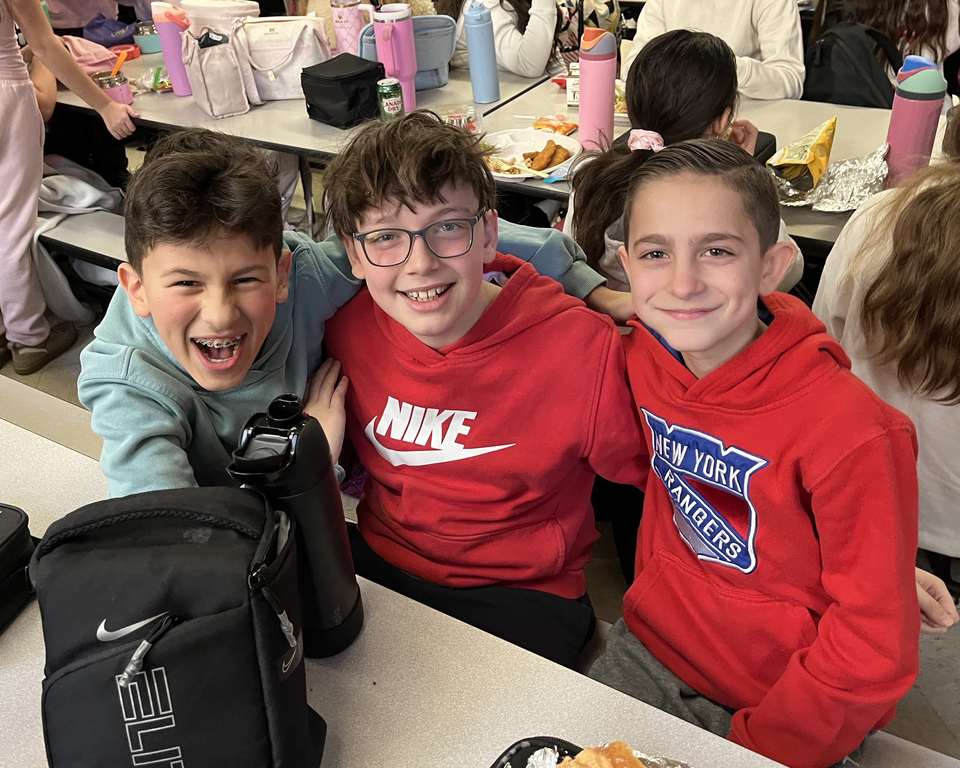 Hunter Brodsky, John Galizia and Jason Gitter enjoy lunch at I.S. 34 in Tottenville. (Advance/SILive.com | Jan Somma-Hammel)