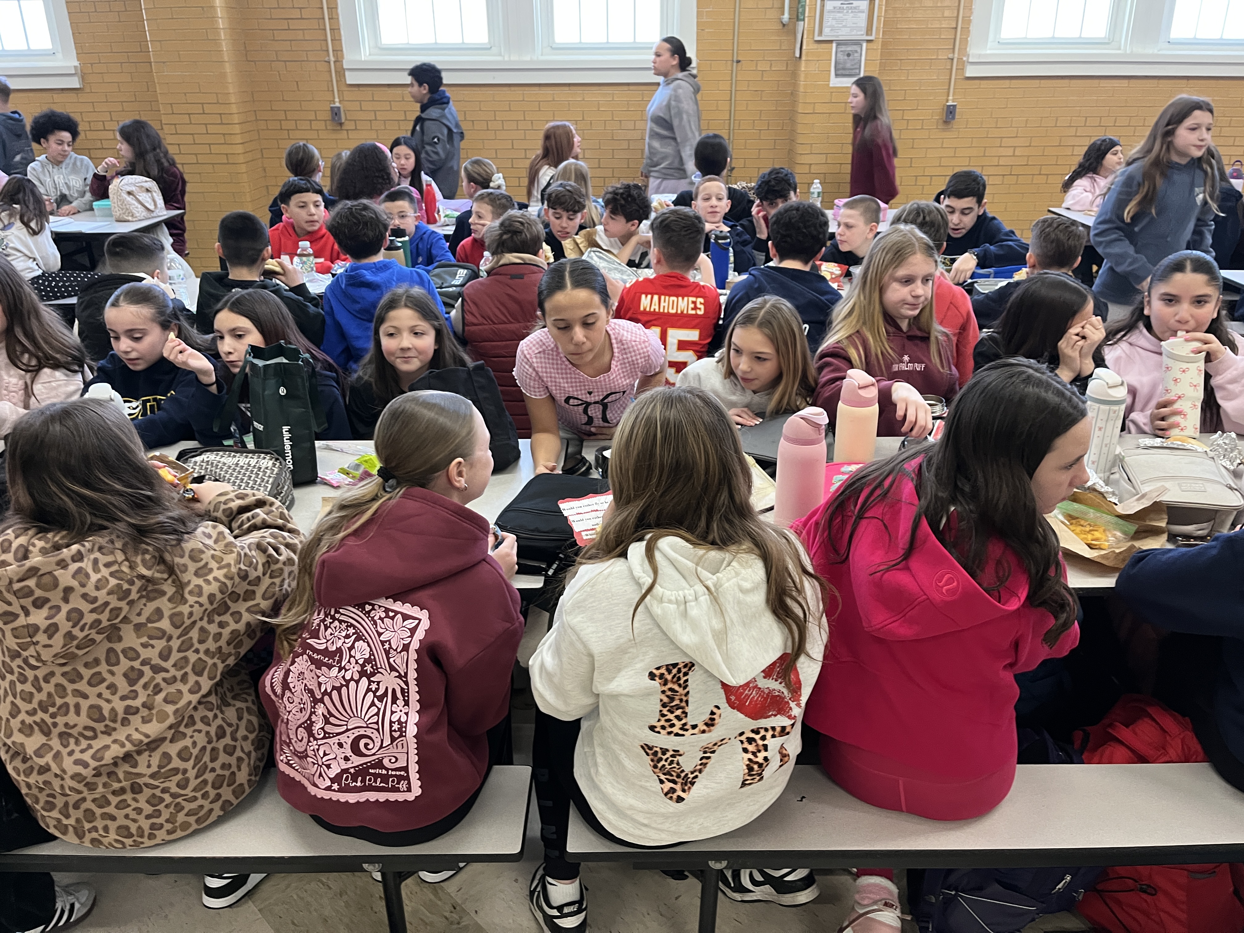 Millions of schools across the United States, including some on Staten Island, like I.S. 34 in Tottenville, took part in National No One Eats Alone Day. The lunchtime program, created by the nonprofit Beyond Differences, aims to make cafeterias more welcoming by encouraging students to connect with classmates they might not usually sit with. Today's lunch also featured dancing. (Advance/SILive.com | Jan Somma-Hammel)