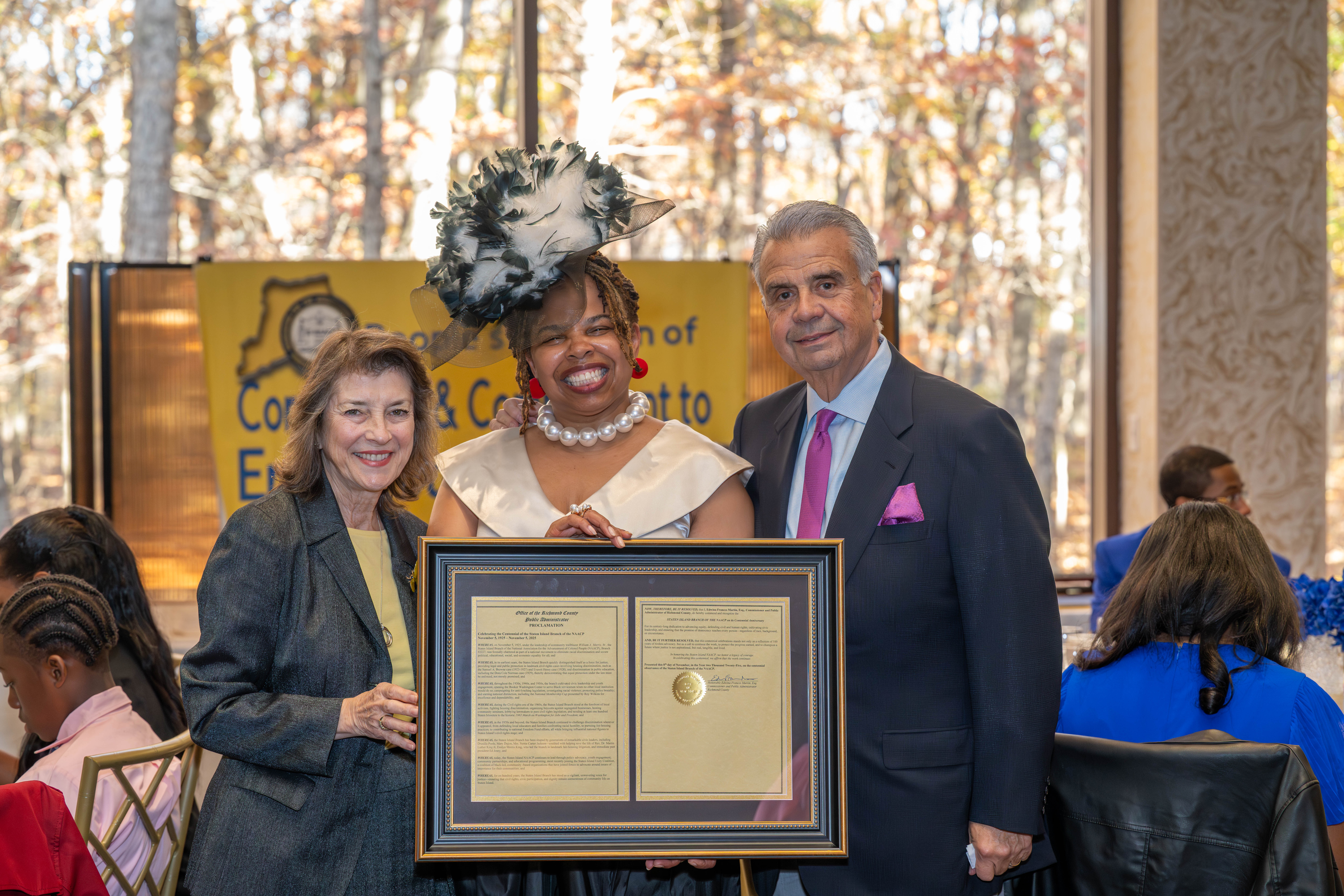 Food and hospitality at the heart of the ballroom: Richard and Lois Nicotra pose with Richmond County Public Administrator Edwina Frances Martin at the Staten Island NAACP’s Freedom Fund Luncheon, held at Nicotra’s Ballroom at the Hilton Garden Inn on Saturday, Nov. 8, 2025. The milestone gathering marked 100 years of service to the community, celebrated inside one of the Nicotras’ signature spaces — a venue known for its warm hospitality, generous tables, and the way it brings Staten Islanders together around food and purpose. (Owen Reiter for the Advance/SILive.com)