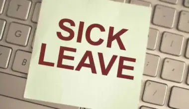 sticky note reading "sick leave" on desk top keyboard; NYC's DCWP Releases Updated ESSTA FAQs and Notice of Employee Rights