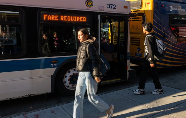A person boards a city bus on Nov. 6, 2025 in Brooklyn. (Photo by Spencer Platt/Getty Images)