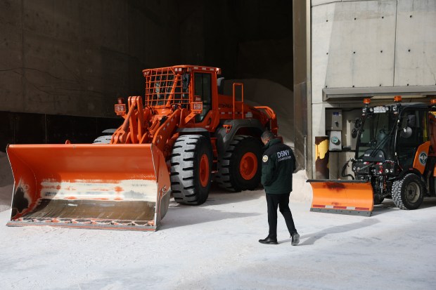 A snow plow is seen at a salt depot following a news conference with New York City Mayor Zohran Mamdani about preparations for the winter storm in New York on Jan. 24, 2026. (Photo by ANGELA WEISS / AFP via Getty Images)