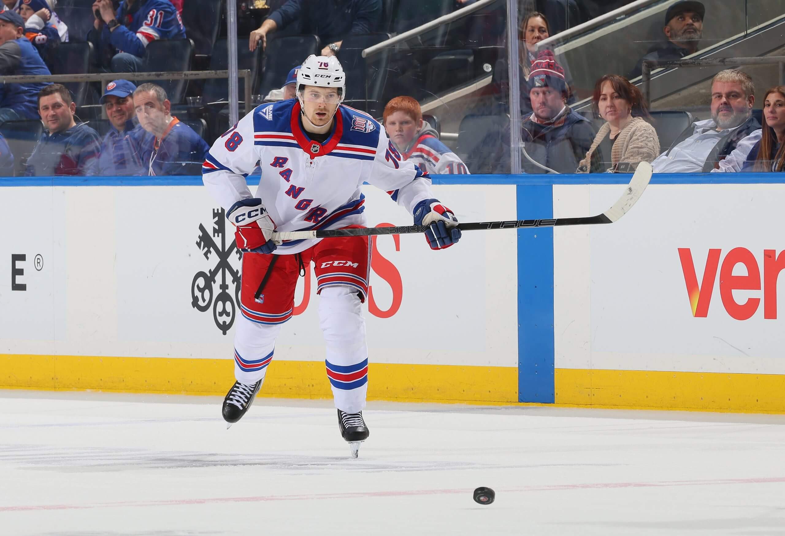 Brennan Othmann skates after the puck during a Rangers game.