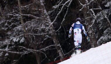 Olympic skier throws poles, heads for woods after skiing out with gold in reach