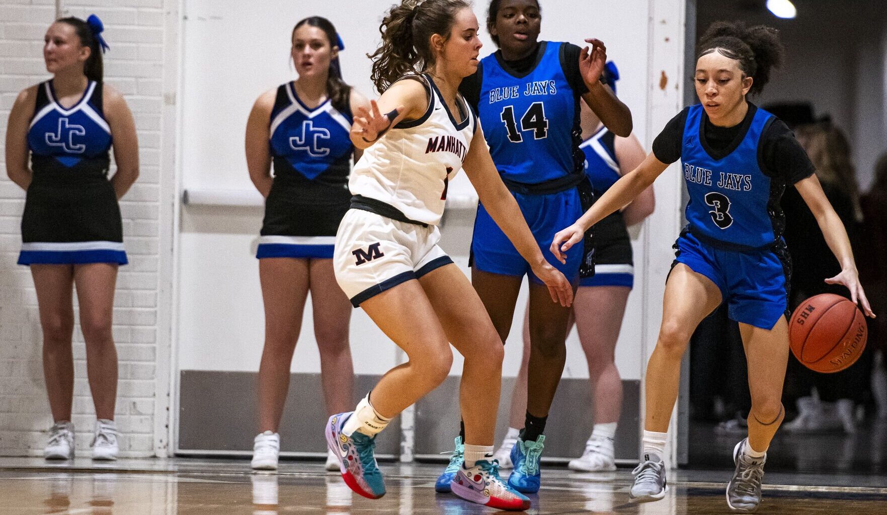 MHS girls sweep Emporia with 58-38 road win