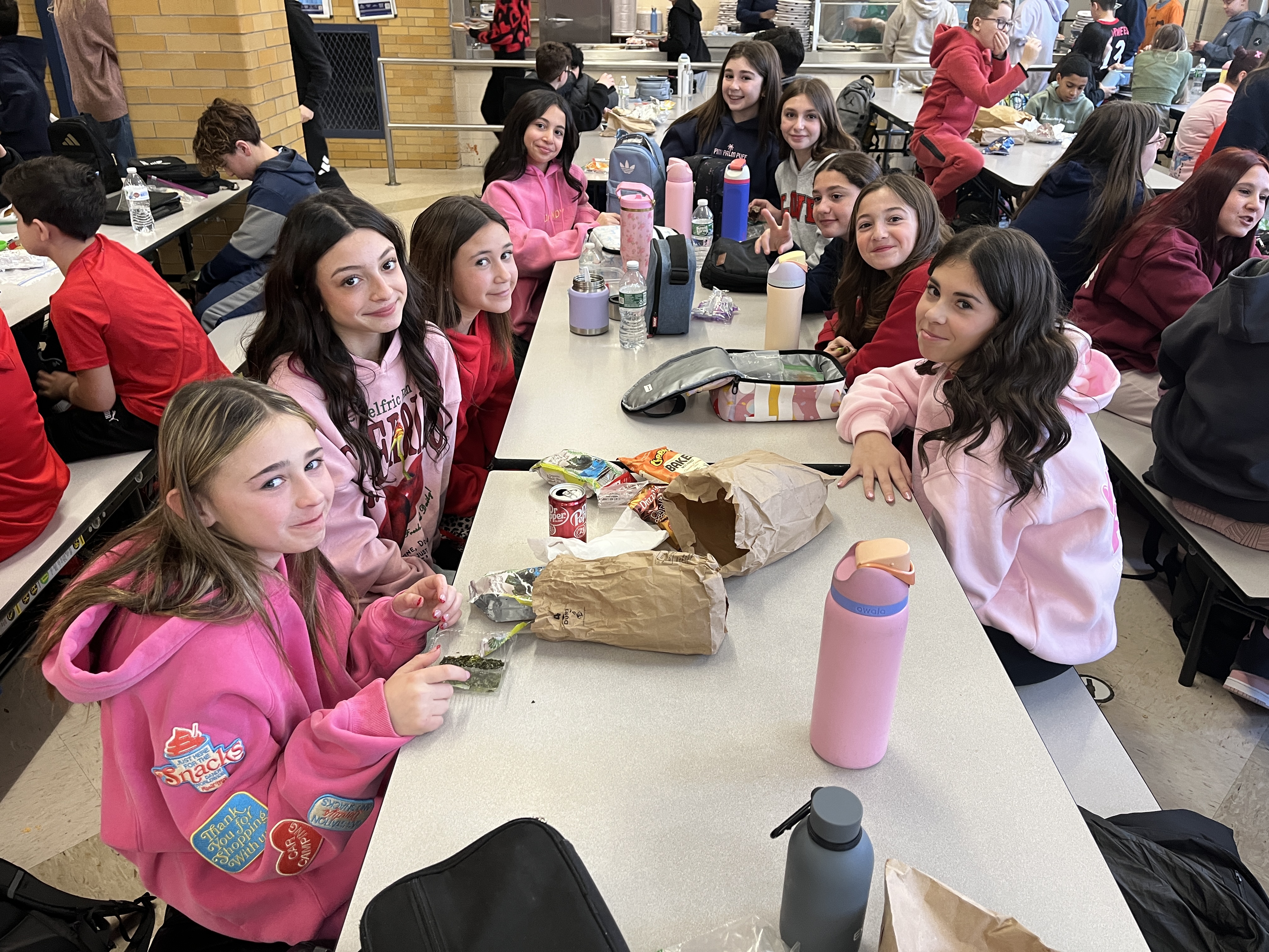 Millions of schools across the United States, including some on Staten Island, like I.S. 34 in Tottenville, took part in National No One Eats Alone Day. The lunchtime program, created by the nonprofit Beyond Differences, aims to make cafeterias more welcoming by encouraging students to connect with classmates they might not usually sit with. Today's lunch also featured dancing. (Advance/SILive.com | Jan Somma-Hammel)