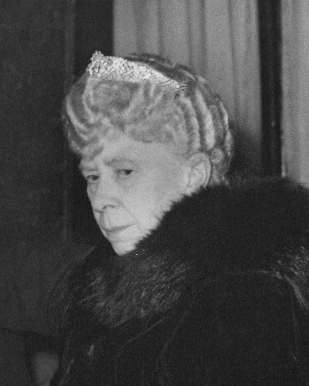 Queen Mary wears the Diamond Bandeau tiara at the London Casino on December 20, 1949.