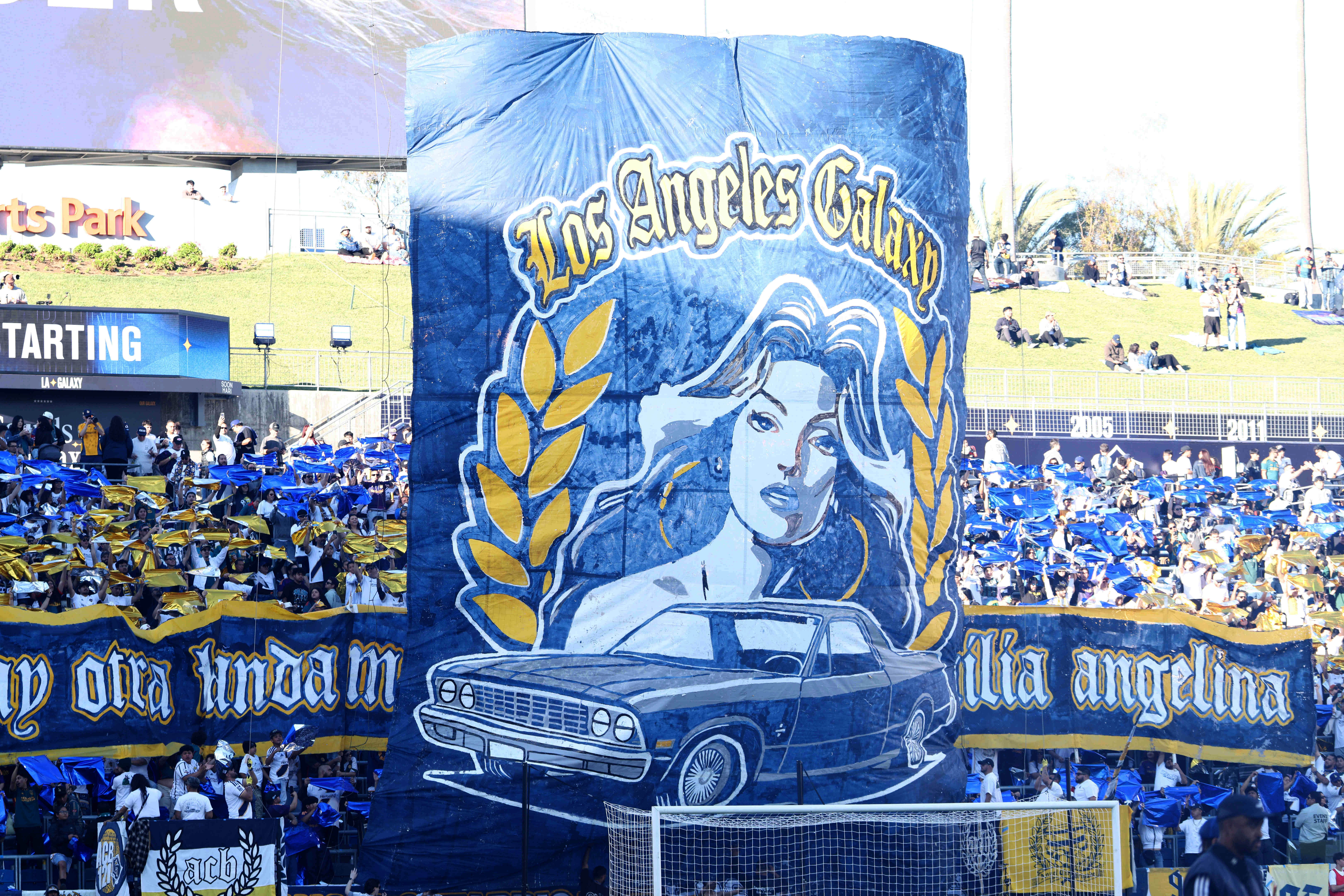 A tifo is lifted before the start of the Galaxy...