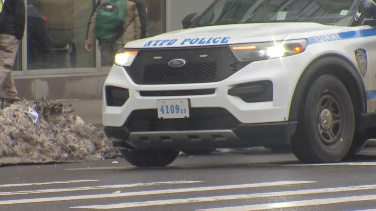 Two NYPD officers are accused of covering up a drunk-driving crash involving another officer. (Spectrum News NY1)