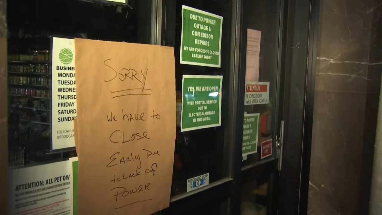 According to Con Edison, the melting snow mixed with road salt damaged underground electrical equipment, knocking out two major power lines feeding the area. (Spectrum News NY1)
