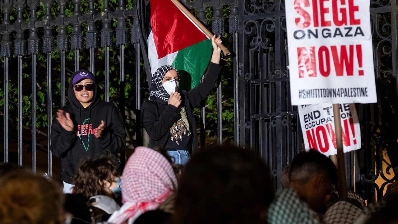 Leqaa Kordia, center, demonstrates with pro-Palestianian protesters at Columbia University in New York, Tuesday, April 30, 2024. (AP Photo/Craig Ruttle, File)