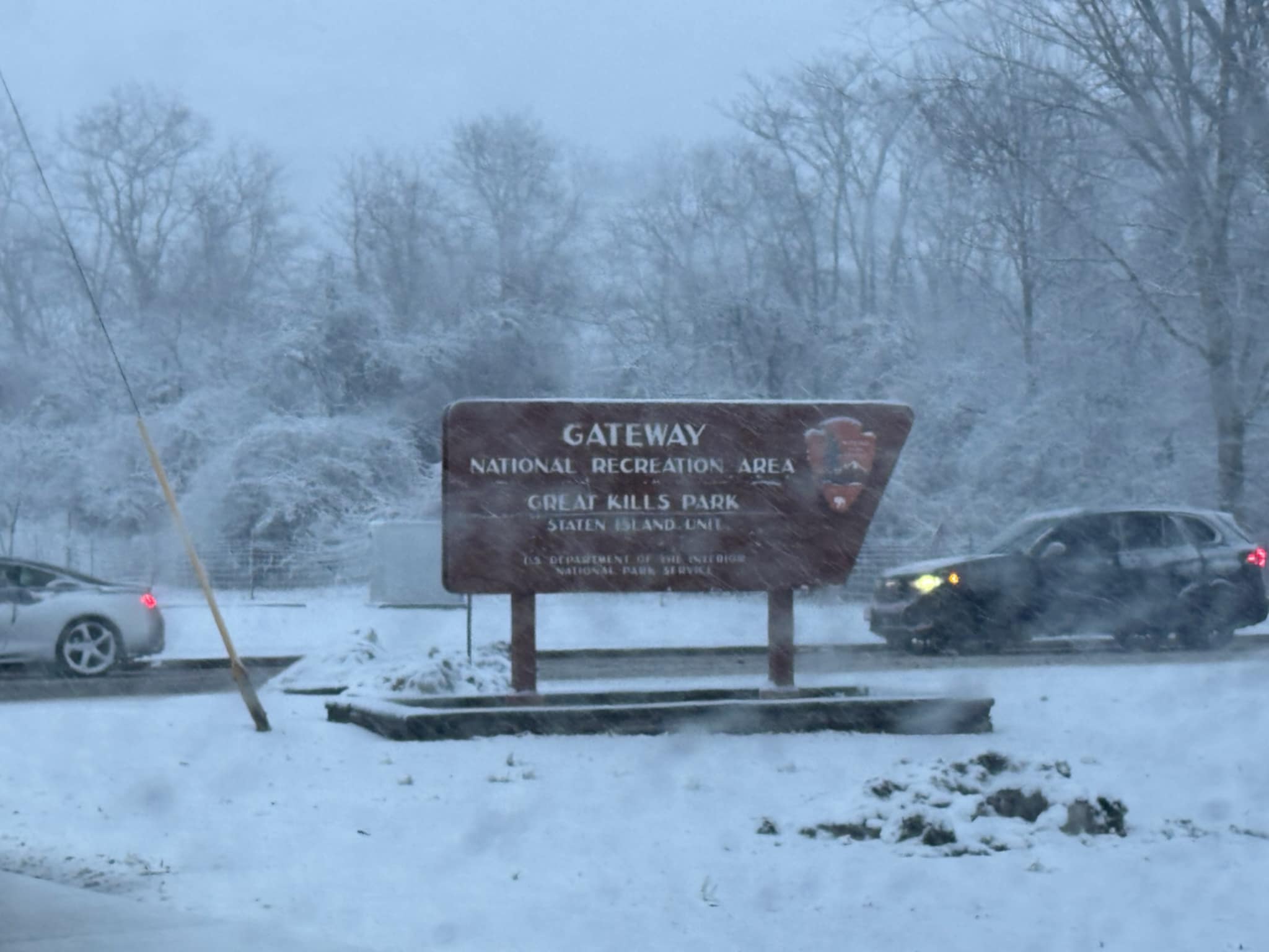 A look at the Gateway National Recreation Area entrance in Great Kills, as snow falls around 5 p.m. on Sunday, Feb. 22, 2026.