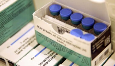 Vials of measles, mumps and rubella vaccine sit in a cooler at the Rockland County Health Department in Pomona, N.Y., March 27, 2019. (AP Photo/Seth Wenig, File)