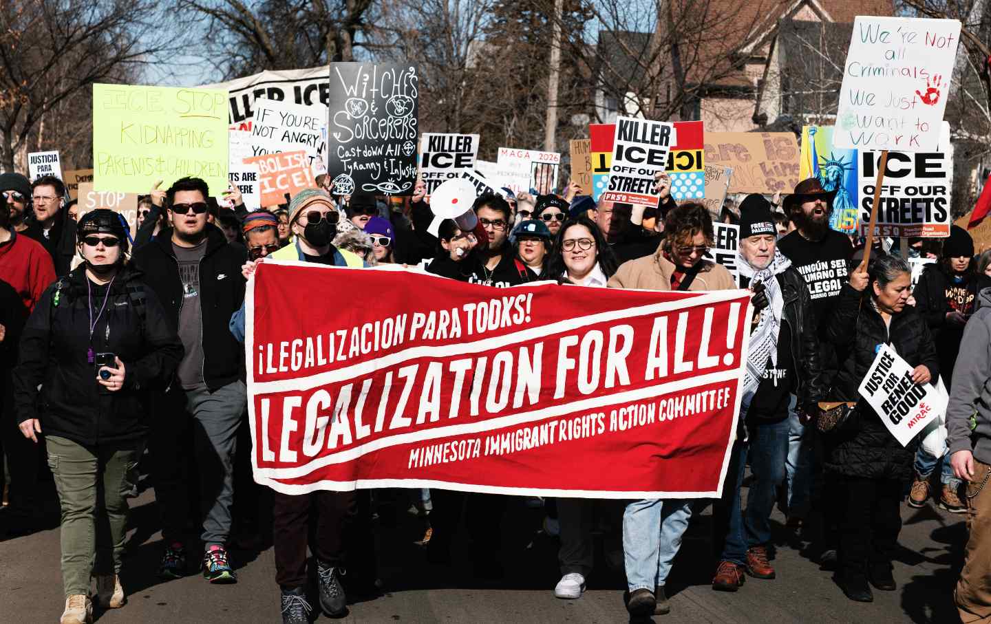 Anti-ICE demonstrators rally at a demonstration organized by the Minnesota Immigrant Rights Action Committee, on February 15, 2026.