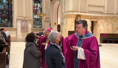 Monsignor Joseph Grimaldi places ashes on the foreheads of worshipers at St. James Cathedral. Photo courtesy John Quaglione/Diocese of Brooklyn