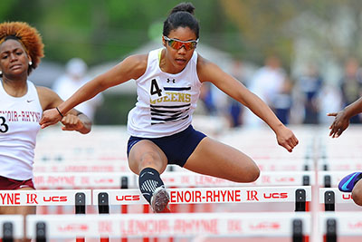 Mystique Ro doing hurdles for Queens