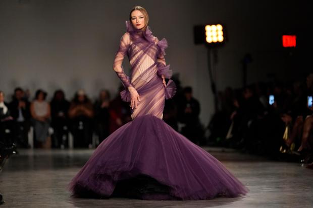 A model walks the runway during the Christian Siriano Fall/Winter 2026 fashion show as part of New York Fashion Week, Thursday, Feb. 12, 2026, in New York. (Photo by Charles Sykes/Invision/AP)