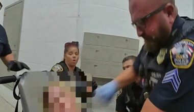 Brooklyn police officer charged with assault after punching handcuffed woman