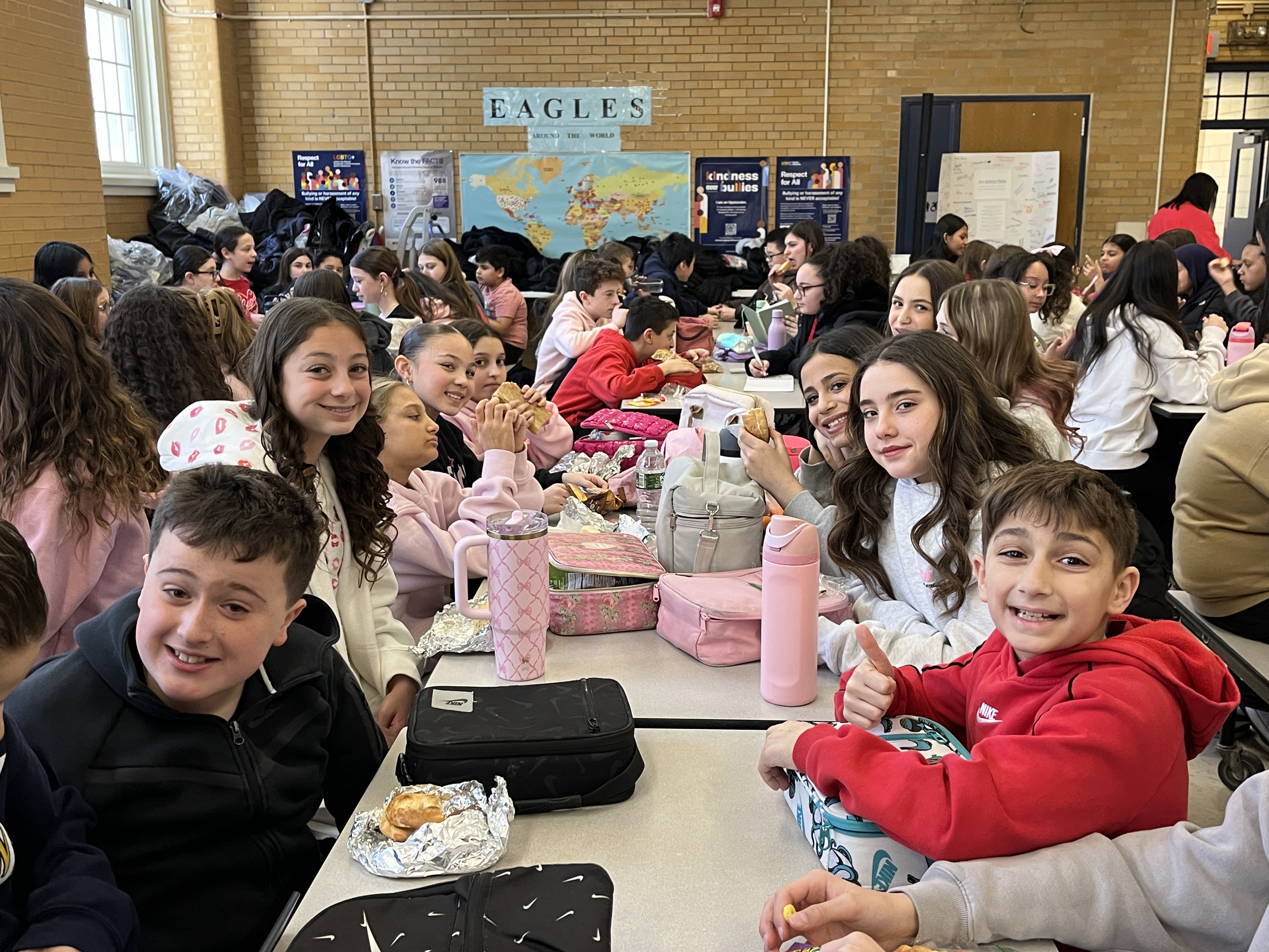 Millions of schools across the United States, including some on Staten Island, like I.S. 34 in Tottenville, took part in National No One Eats Alone Day. The lunchtime program, created by the nonprofit Beyond Differences, aims to make cafeterias more welcoming by encouraging students to connect with classmates they might not usually sit with. Today's lunch also featured dancing. (Advance/SILive.com | Jan Somma-Hammel)