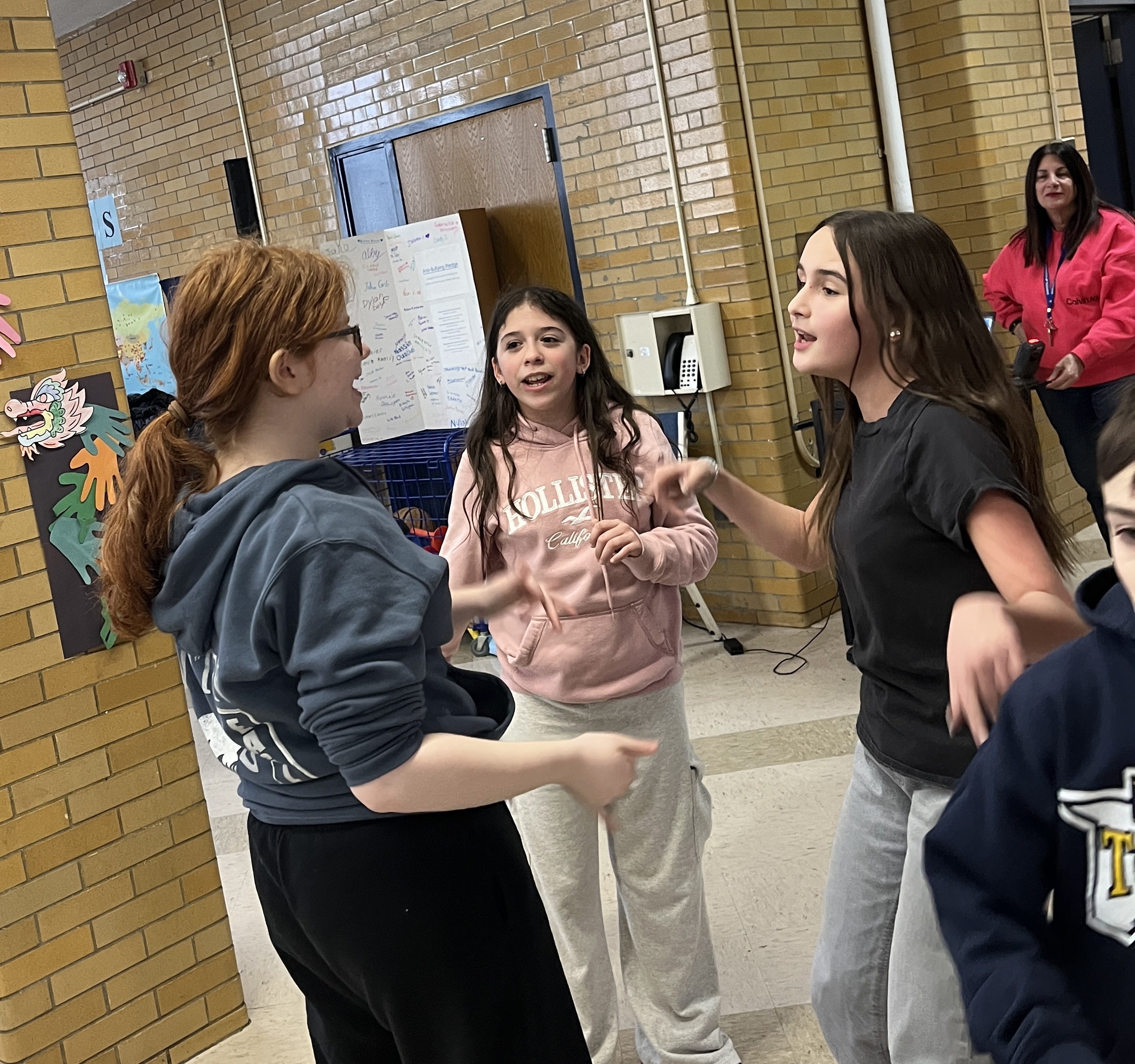 Millions of schools across the United States, including some on Staten Island, like I.S. 34 in Tottenville, took part in National No One Eats Alone Day. The lunchtime program, created by the nonprofit Beyond Differences, aims to make cafeterias more welcoming by encouraging students to connect with classmates they might not usually sit with. Today’s lunch also featured dancing. (Advance/SILive.com | Jan Somma-Hammel)