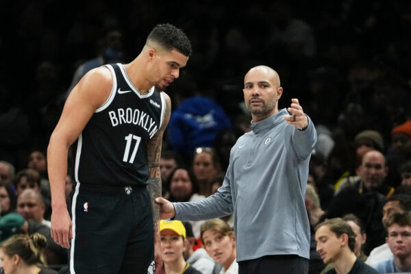 Brooklyn Nets head coach Jordi Fernandez, right, talks to Michael Porter Jr. (17) during the first half of an NBA basketball game Monday, Dec. 29, 2025, in New York. (AP Photo/Frank Franklin II)
