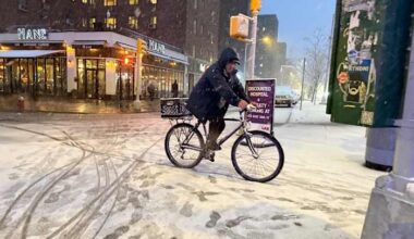 New York City hunkers down under blizzard warnings and a travel ban as winter storm hits Northeast