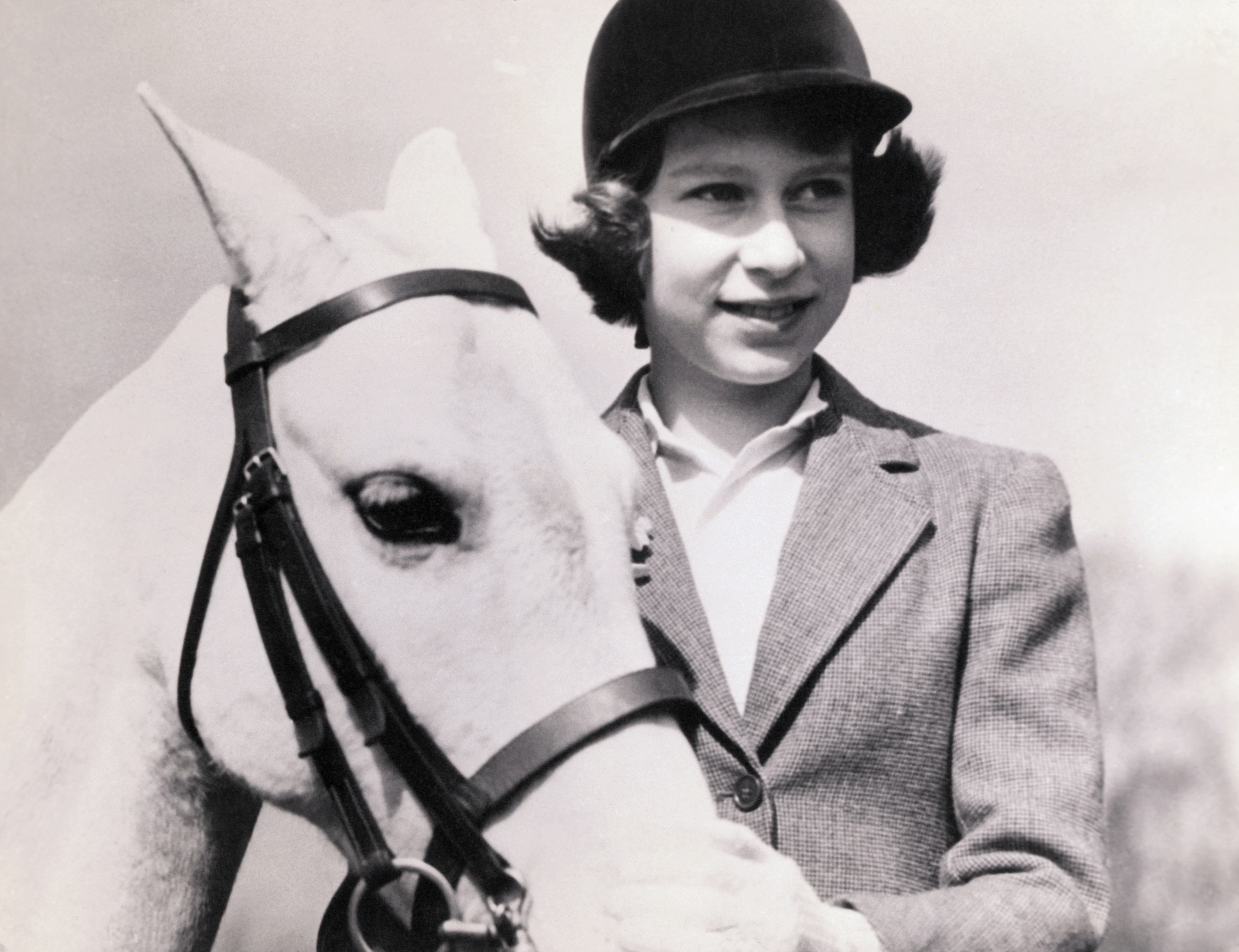 Princess Elizabeth at age 10 with her pony