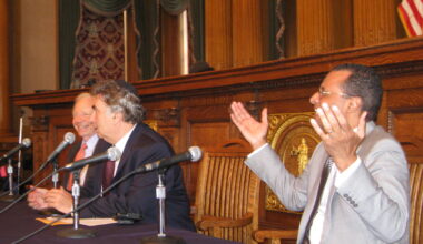 Pastor A.R. Bernard, at right, expressively makes a point during a panel discussion with the late Senator Joseph Lieberman and Rabbi Joseph Potasnik at a 2011 Borough Hall panel discussion on Lieberman’s book. The forum was held in conjunction with the Brooklyn Book Festival. Photo: Francesca N. Tate/Brooklyn Eagle