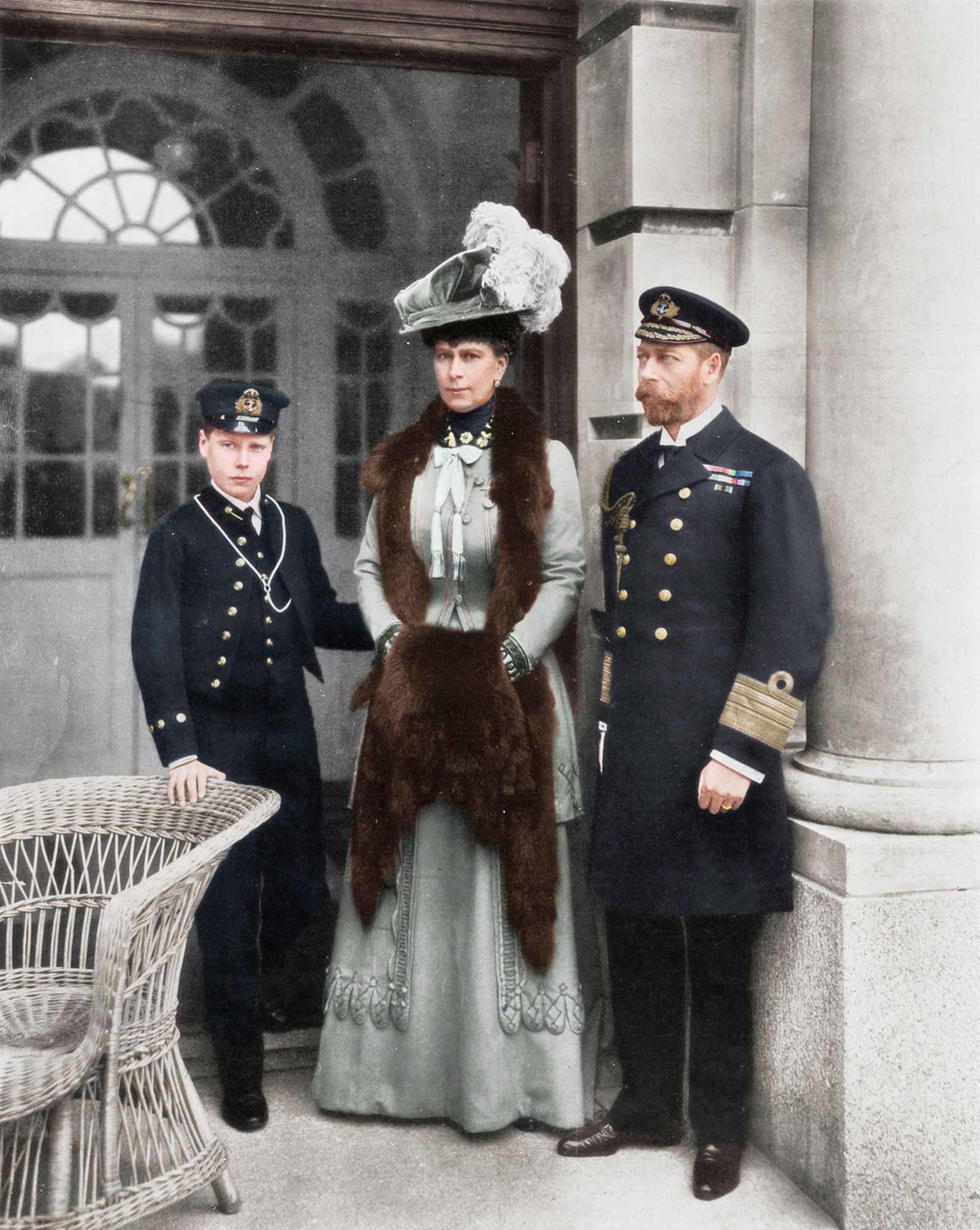 Image may contain George V Edward VIII Person Adult Clothing Coat Chair Furniture Footwear and Shoe