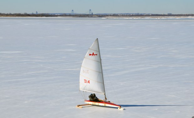 Retired firefighters and Broad Channel natives, Dan Mundy Sr., 88, and Dan Mundy Jr., 62, have been able to take out their ice boat to sail on the frozen Jamaica Bay for the first time in 12 years amid the city's prolonged cold spell. (Photo by Marissa Orecchio)