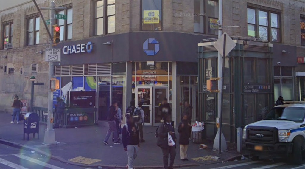 Street view of West 125 Street and St. Nicholas Avenue in New York City, featuring a Chase bank branch and a subway station entrance.