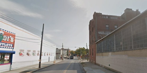 A group of four suspects opened fire on Wyckoff Ave. near Summerfield St. in Ridgewood, Queens, on Tuesday, with one bullet striking the uninvolved bystander in the leg. (Google)