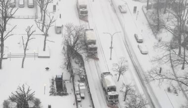 Whiteout: A team of snowplows makes its way along Cadman Plaza West at the start of Winter Storm Fern. Photo: Mary Frost, Brooklyn Eagle