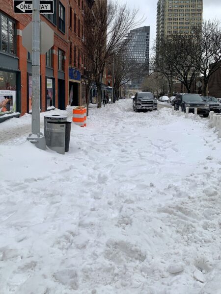 What bike lane? This seemingly open stretch of snow on Henry Street in Brooklyn Heights covers a newly-installed bike lane, currently unusable. Photo: Mary Frost, Brooklyn Eagle