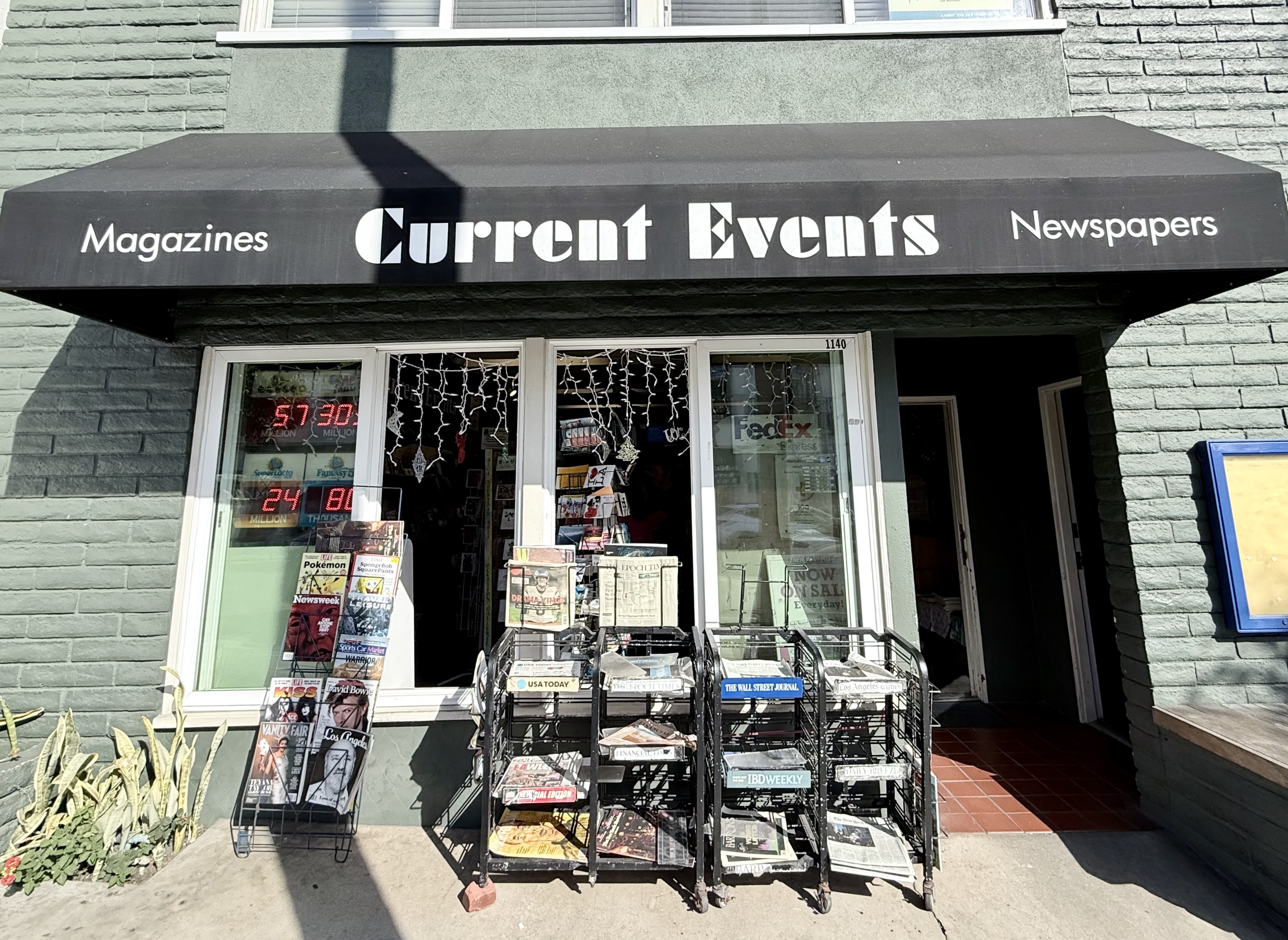 Current Events, a newsstand shop owned by Tom and Kay...