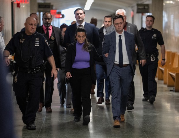NYPD Officers Michael Caligiuri, left, and Ryan McLoughlin are led into a Manhattan Supreme Court courtroom Friday, Feb. 20, 2026 Manhattan, New York. (Barry Williams/ New York Daily News)