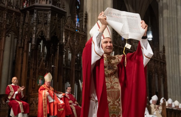 Archbishop Ronald Hicks walks with The Apostolic Letter during mass at St. Patricks Cathedral Friday, Feb. 6, 2026 in Manhattan, New York. (Barry Williams/ New York Daily News)