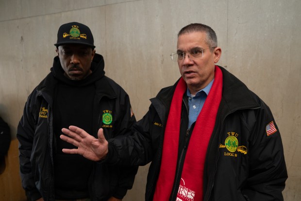 TWU Local 100 President John Chiarello, right, and VP of Rapid Transit Operations Tramell Thompson speak to the media in Manhattan Supreme Court after Leonard Johnson's sentencing on Wednesday, Feb. 25, 2026. (Barry Williams/ New York Daily News)