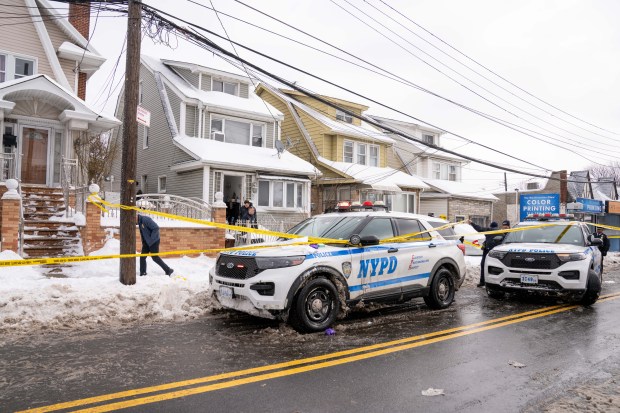 Police are pictured after NYPD officers shot a man who allegedly advanced on them while refusing to drop a knife inside a home on Parsons Blvd. in Queens on Monday, Jan. 26, 2026. (Theodore Parisienne / New York Daily News)