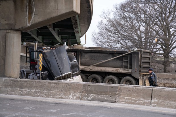 Police investigate after a livery driver was killed in a crash with a tractor-trailer on the Long Island Expressway in Queens on Feb. 6, 2026. (Theodore Parisienne / New York Daily News)
