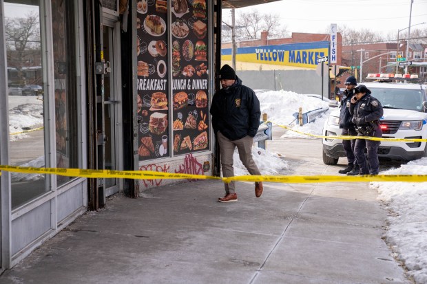 A 39-year-old man was stabbed in the abdomen and slashed in the face by an attacker with an unknown object near an apartment building on Ave. H and E. 58th St. in Flatlands, Brooklyn, on Saturday, Feb. 7, 2026. A trail of blood was seen from the apartment building to the Ock Spot deli one block away near Ave. H and East 59th St. (Theodore Parisienne / New York Daily News)