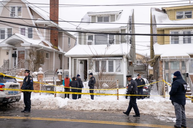 Police are pictured after NYPD officers shot a man who allegedly advanced on them while refusing to drop a knife inside a home on Parsons Blvd. in Queens on Monday, Jan. 26, 2026. (Theodore Parisienne / New York Daily News)