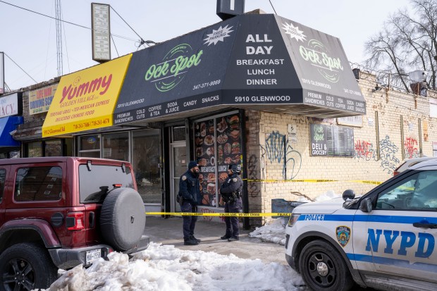 A 39-year-old man was stabbed in the abdomen and slashed in the face by an attacker with an unknown object near an apartment building on Ave. H and E. 58th St. in Flatlands, Brooklyn, on Saturday, Feb. 7, 2026. A trail of blood was seen from the apartment building to the Ock Spot deli one block away near Ave. H and East 59th St. (Theodore Parisienne / New York Daily News)